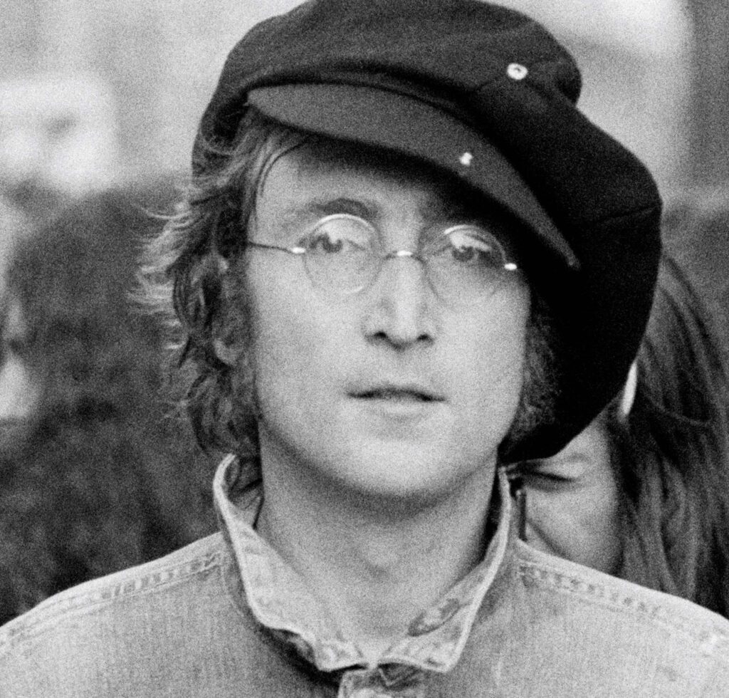 John Lennon with his hat